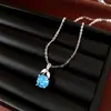 Set de pendientes, collar y anillo con colgante de flor redonda de circón con aguja de plata, accesorios de lujo ligero de alta gama, joyería exquisita para mujer