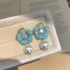 Aretes de Flor Azul con Perlas Colgantes y Aguja de Plata Flor de Resina Estilo Fresco de Verano Aretes Lujo Ligero Sensación de Alta Gama Joyería para Orejas Venta al por Mayor