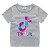 2026 Nova Roupa Infantil Verão Camiseta de Manga Curta para Meninos e Meninas Camiseta Base de Algodão Camiseta de Meia Manga para Bebê Top Infantil