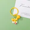 Llavero de oso con cascabel de resina color macarrón, lindo y suave, colgante de llavero de cuentas DIY para niñas