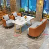 Juego de sofá de un asiento y mesa de centro para recepción de hotel, sala de reuniones de clientes, oficina de ventas, salón de belleza, centro comercial, mueble de sala de exposición, gama alta