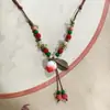 Collar con colgante de campana de mariposa de cerámica de estilo étnico retro para mujer, diseño nuevo y moderno, cadena larga para suéter, accesorios