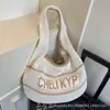 Bolso de Mano Tejido Simple Estilo Coreano Literario para Mujer 2025 Verano Nuevo Retro Hueco con Letra Bolso de Hombro para Axila