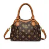 Suministro directo transfronterizo de bolsos cruzados para mujer, nuevo bolso de mano retro de moda 2026, bolso cuadrado pequeño simple y versátil