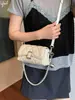 Bolso de cadena popular transfronterizo con patrón de rombos simples para mujer, nuevo bolso de hombro de moda de tendencia 2026, bolso cuadrado pequeño cruzado con estilo