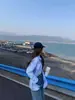 Camisa Listrada Azul Estilo Francês para Mulheres 2025 Nova Versão Coreana Petite Solta Preguiçosa Proteção Solar Top