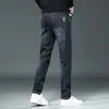Venta al por mayor Jeans de Mezclilla Primavera y Otoño Marca de Moda para Hombre Pantalones Casuales Rectos Sueltos Pantalones de Hombre Lavados al Agua a la Moda Pantalones Largos Elásticos Versátiles