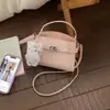 Bolsa de Mão de Luxo Leve Estilo Coreano para Mulheres Nova Moda Primavera 2026 Bolsa de Ombro para o Dia a Dia Elegante Bolsa Transversal de Cor Sólida para Mulheres