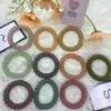 5.5 diámetro exterior banda para el pelo de cable telefónico cuerda para el pelo pulsera de plástico color japonés y coreano accesorios para el pelo