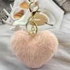 Llavero de Corazón de Melocotón de Felpa Más Vendido Colgante de Llavero de Bola de Pelo de Amor Colgante para Equipaje de Dama Coche Venta al por Mayor
