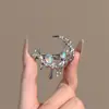 Diseño de Nicho Metal Líquido Piedra Lunar Luna Pinza para el Pelo Flequillo Lateral Pinza de Pato 2026 Nueva Pinza para el Pelo