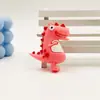 Chaveiro Pingente de Figurine de Dinossauro Desenho Animado em Borracha Macia PVC Ornamento Acessório Clássico Dinossauro Tiranossauro Rex