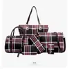 2026 Nueva Bolsa Rayada de Gran Capacidad Set de Múltiples Piezas para Mujer Bolso de Mujer Bolso de Hombro Popular Estampado para Mujer