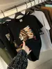Camiseta Casual de Moda Versátil Multicor com Estampa para Casal, Gola Redonda, Manga Curta, Tecido Macio Respirável de Alta Gramatura, Tendência