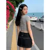 Mini falda de mezclilla azul oscuro de cintura alta para mujer talla grande, nuevo modelo de verano 2026, falda línea A absolutamente deslumbrante y hermosa