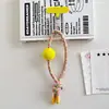 Colgante de teléfono de pompón de hilo de color dopamina de moda, llavero elegante y simple, accesorio para bolso, diseño creativo