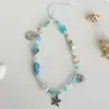Europa y Estados Unidos transfronterizo verano océano estilo ins concha de mar estrella de mar concha de abanico cadena para teléfono móvil colgante de teléfono móvil con cuentas pequeño y fresco