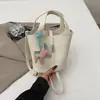 Bolso cesta versátil estilo lujo ligero para el trabajo y los desplazamientos, bolso de hombro y cruzado de gran capacidad, bolso tipo cubo de moda para mujer