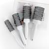 Comercio exterior al por mayor peine de tubo de aluminio cerámico conductor térmico peine para el cabello flequillo forma de cabeza de flor de pera peine para cabello rizado peine resistente a altas temperaturas