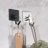 Gancho sin marca de acero inoxidable para el hogar transfronterizo, gancho adhesivo fuerte sin perforación, gancho de almacenamiento multifuncional engrosado para baño y cocina