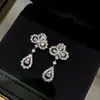Pendientes de Gota Flor de Deseo Hui Tan Muestran la Cara Pequeños Huecos Pendientes Exquisitos Estilo Occidental para Mujer Pendientes Elegantes