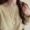 Colar pingente de concha estrela-do-mar pérola em cordão de cera corrente de clavícula de férias de verão corrente de suéter doce fresca moda feminina