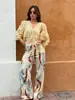 Camisa de diseño europeo y americano transfronterizo, otoño 2026, nueva, de Lyocell, fina, transparente, cuello en V, plisada, con diseño de corbata, manga abullonada