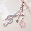 Novo Charme de Bolsa Coração Girly Feito à Mão com Nota Musical de Guitarra Chaveiro Estilo Ins Pingente Fofo Gu-Ben-Gu