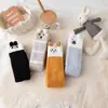 Calcetines de terciopelo de coral para mujer, otoño e invierno, forro polar, gruesos y cálidos, calcetines hasta la rodilla o la pantorrilla de dibujos animados de felpa lindos japoneses