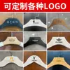 Percha Plástica de Hombro Ancho Sin Costuras Percha para Ropa Percha Tienda de Ropa Percha al por Mayor Tienda de Ropa para Mujer Fábrica de Perchas Venta Directa