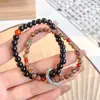 Pulseras apilables de estilo retro chino nuevo de gran venta, Pulseras multicapa de diseño nicho de estilo antiguo nuevo de gran venta 2025