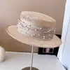 Chapéu de luxo leve, fio de cânhamo filipino, fita de pérola, chapéu plano feminino, primavera e verão, todos os tipos de proteção solar, chapéu de palha, moderno