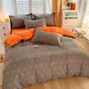 Juego de cama de cuatro piezas de algodón lavado fresco pequeño grueso para lijar funda nórdica funda de almohada ropa de cama de tres piezas para dormitorio de estudiantes