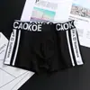 Ropa interior para hombre pantalones cortos de boxeo para hombre tendencia de personalidad estudiantes jóvenes color liso algodón transpirable pantalones cortos de boxeo una generación de pelo