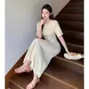 Vestido redondo elegante estilo coreano para mulheres, novo modelo de verão 2026, acinturado, emagrecedor, elegante vestido de tricô com vazados