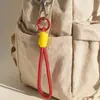 Novo cordão minimalista tecido à mão, pulseira com blocos de cor, acessório de chaveiro, cordão portátil, decoração de bolsa anti-perda
