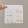 Pendientes combinables puesto de mercado nocturno al por mayor Corea del Sur pendientes explosivos simples diseño de nicho femenino pendientes de moda con temperamento