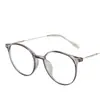 Armazón de gafas ovalado liso estilo coreano, retro y ligero, con diseño de remaches, gafas con bloqueo de luz azul, populares entre las celebridades de internet, disponibles con lentes sin graduación