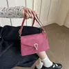 Bolso pequeño cuadrado de un solo hombro cruzado de moda retro de alta gama estilo coreano 2026 principios de otoño con hebilla simple versátil