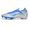 Zapatillas de fútbol de punto fly sin costuras transfronterizas para hombre y mujer, de caña baja AG con tacos largos para césped artificial exterior TF, en stock al por mayor