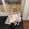 Bolsa Tote Nova Estilo Coreano de Nicho de Alto Valor para Mulheres, de Mão, Ombro, Transversal, Requintada, Fashion, Versátil