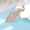 Broche de cristal de liga de alta qualidade direto da fábrica, feminino, com strass colorido, broche de pavão, joia para roupa