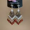Pendientes de gota con incrustaciones de diamantes transfronterizos europeos y americanos, pendientes de lujo de alta gama, accesorios para orejas de moda de nicho, venta al por mayor desde fabricante de Yiwu