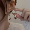 Moda de Año Nuevo estilo occidental estilo chino pendientes con incrustaciones de diamantes para mujer rojo en línea de alta calidad combinan con todo adelgazan la cara pendientes rojos