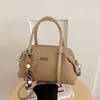 Bolsa de Mão de Nicho de Luxo para Mulheres 2026 Nova Outono Retrô Casual Moda Trabalho Ombro Único Transversal