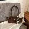 Bolsa baguette de luxo estilo francês, bolsa de bolinho moderna e da moda, adequada para o trajeto diário, bolsa de ombro e sob o braço versátil e moderna