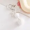 Popular Transfronteiriça Laço de Fita Veludado Orelhudo Boneca de Três Anos Chaveiro Cartoon Acessórios Chaveiro Colorido Doce