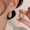 Pendientes geométricos con hebilla de oreja de estilo frío, sencillos, ligeros, de lujo, de gran sentido, para mujer, versátiles, venta al por mayor