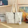 Bolsa tote de gran capacidad para mujer, nuevo modelo 2026, adecuada para estudiantes universitarios, hombro de nicho para ir al trabajo, bandolera y bolso de mano para mujer