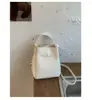 Bolso de diseño de moda transfronterizo de nicho para mujer, bolso tipo cubo texturizado simple nuevo, bolso de hombro y bandolera de gran capacidad